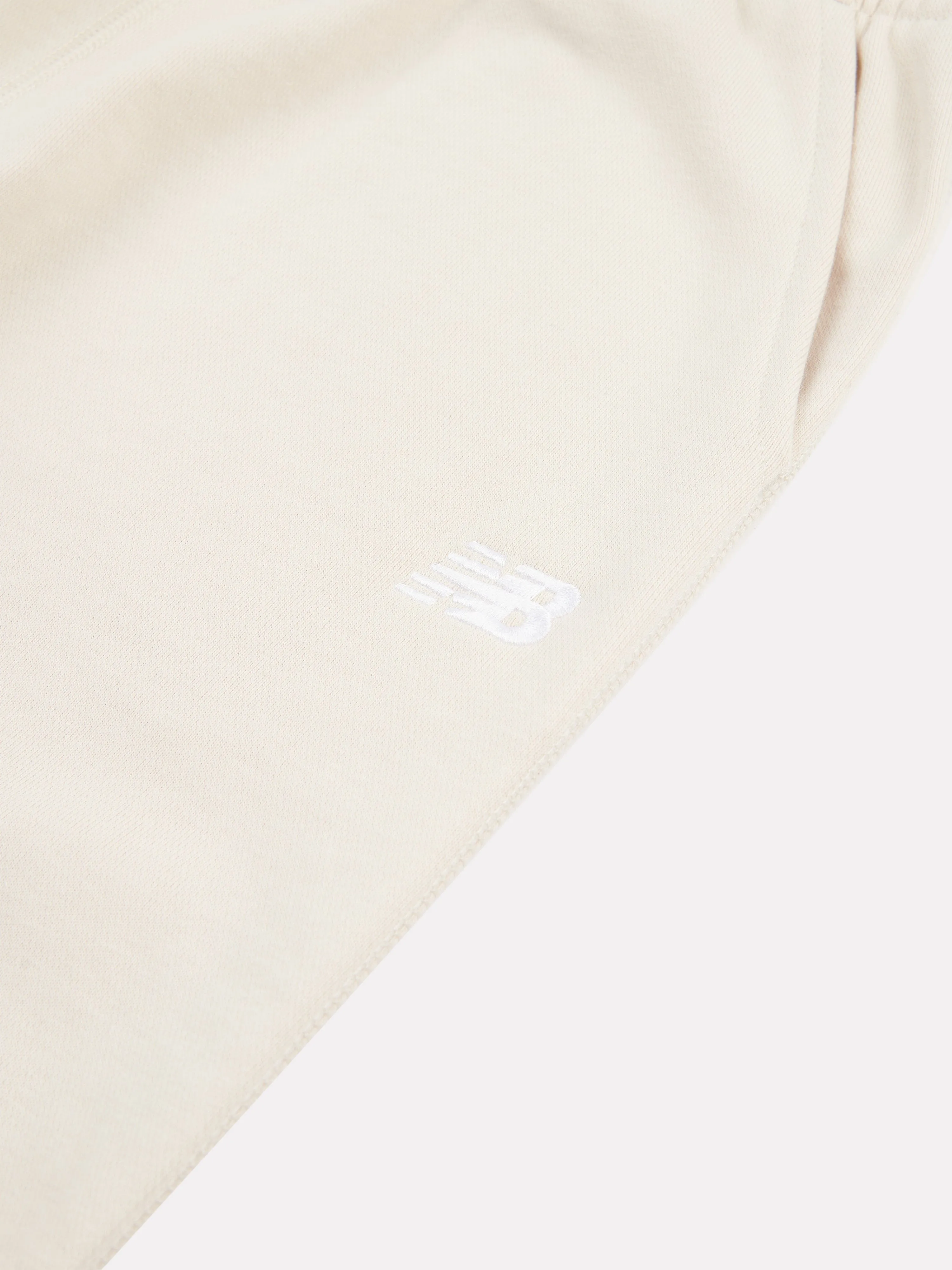 New Balance Girls French Terry Small Logo Joggers in Beige