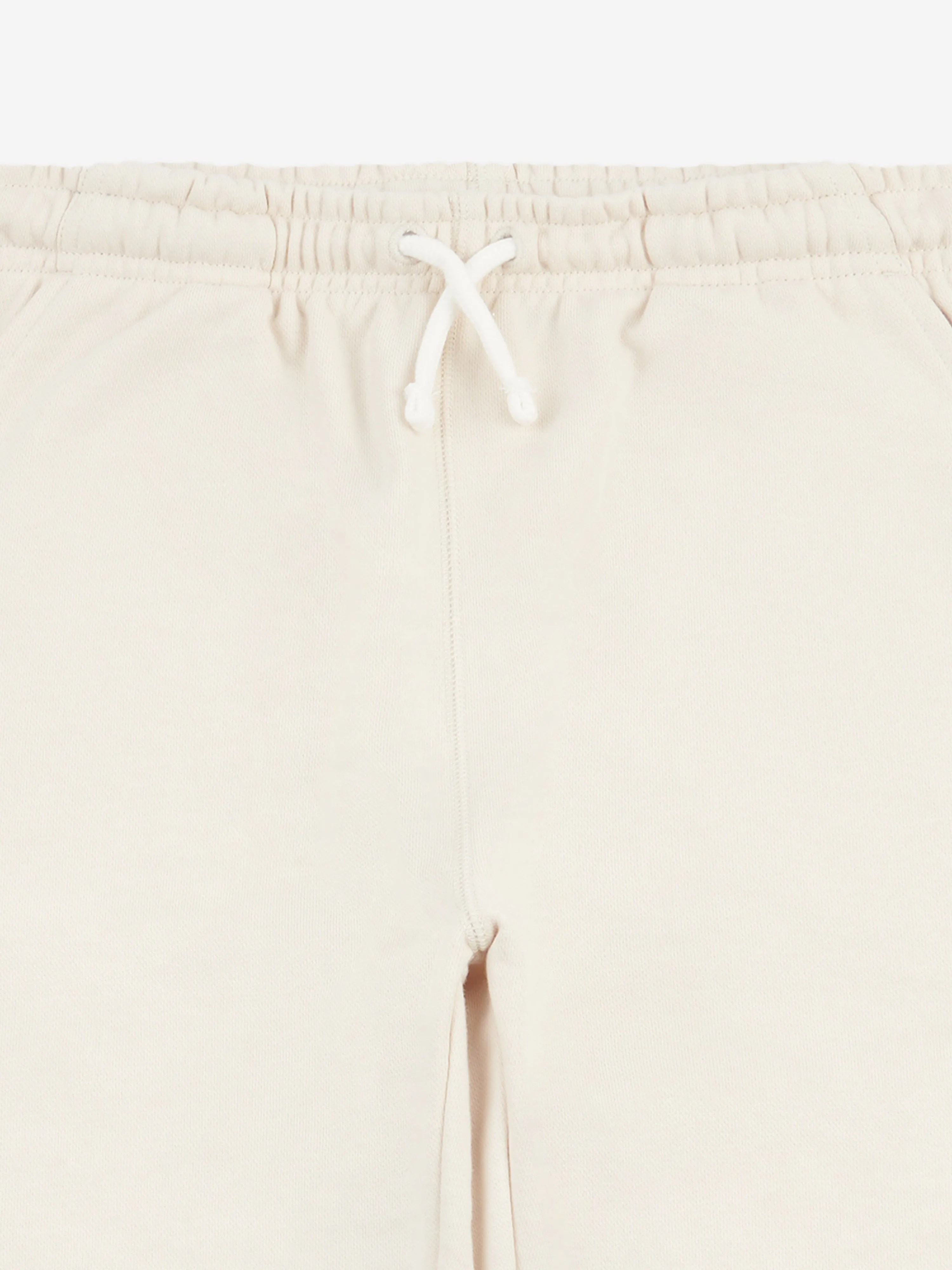 New Balance Girls French Terry Small Logo Joggers in Beige